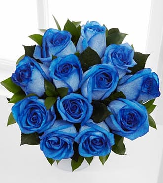 Imagen de Amar azul Descripcion: Ramo de 12 rosas azules teñidas